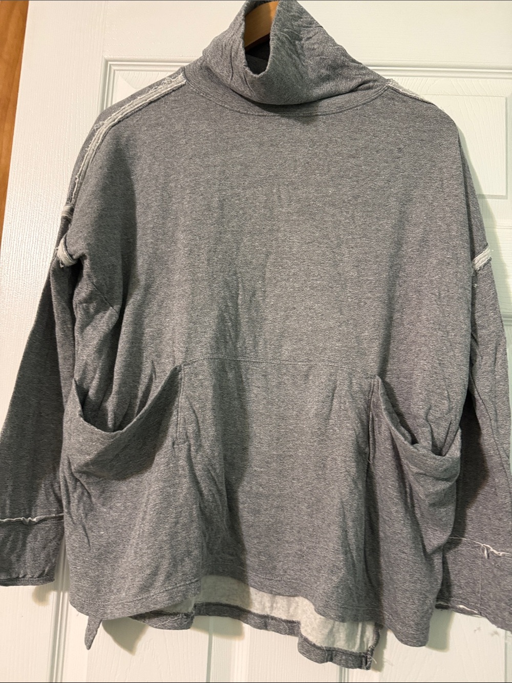 Free people distressed turtle neck.